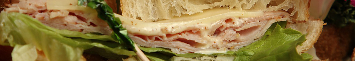 Eating Sandwich at Misquamicut Sandwich Company restaurant in Westerly, RI.